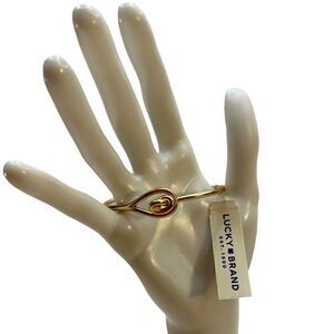 Lucky Brand Gold Toned Love Knot Bracelet.
